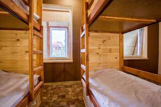 Хостелы Hostel Tarnopil Тернополь Кровать в общем номере с 4 кроватями-1